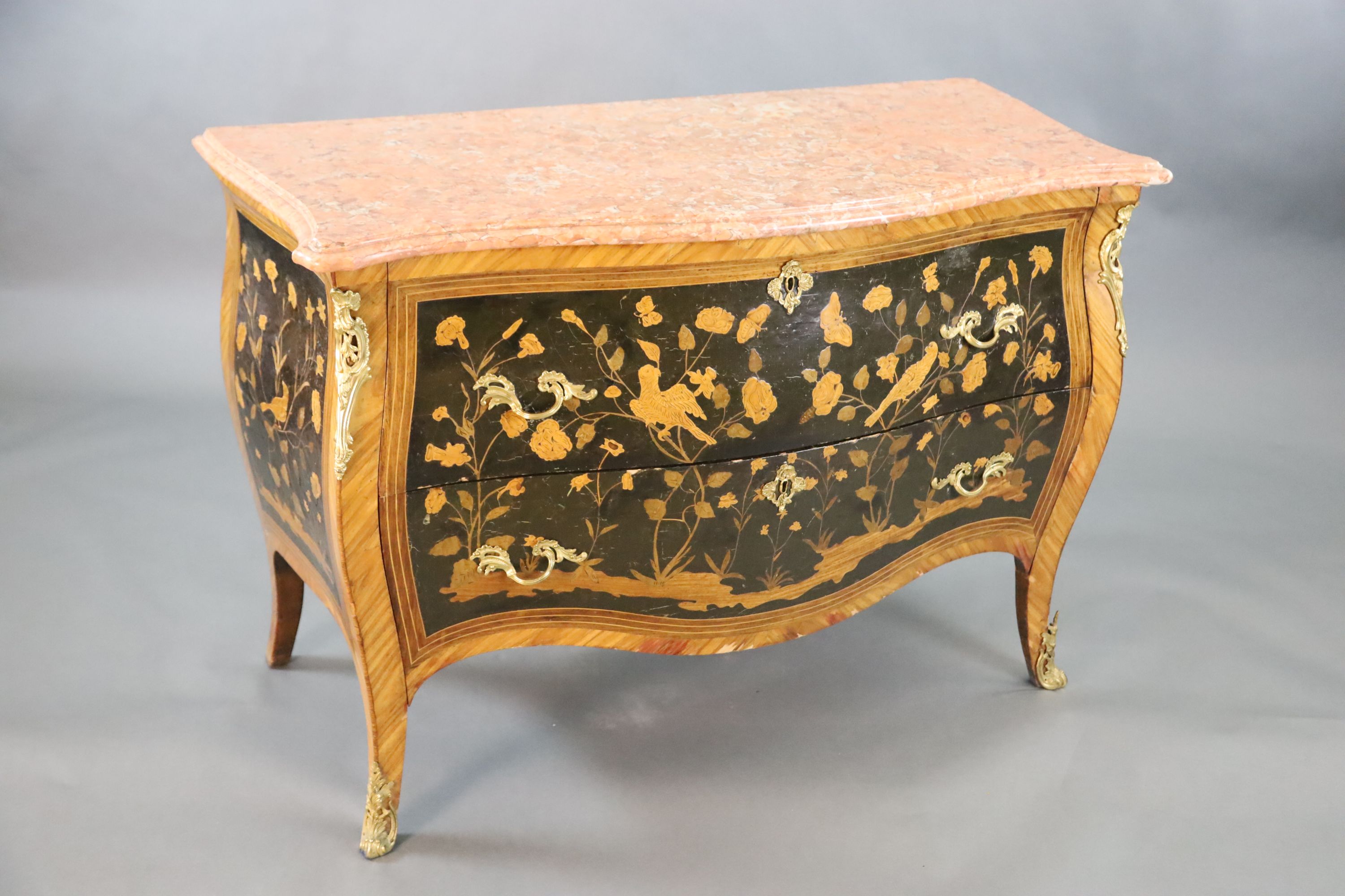 A French Louis XV style kingwood and ormolu mounted serpentine bombe commode, W.4ft D.2ft H.2ft 11in.